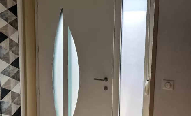 Remplacement des menuiseries PVC et d'une porte d'entrée avec inserts inox à Vermelles, Arras, CHM Menuiserie
